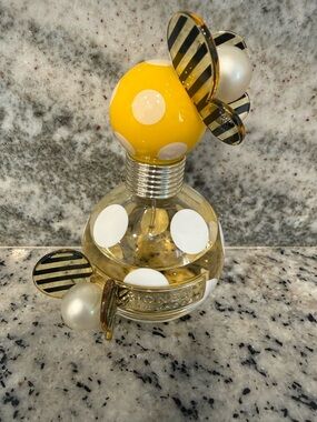 Marc Jacobs Daisy Polka Dot Bottle with Yellow Cap and Black-Striped Accents